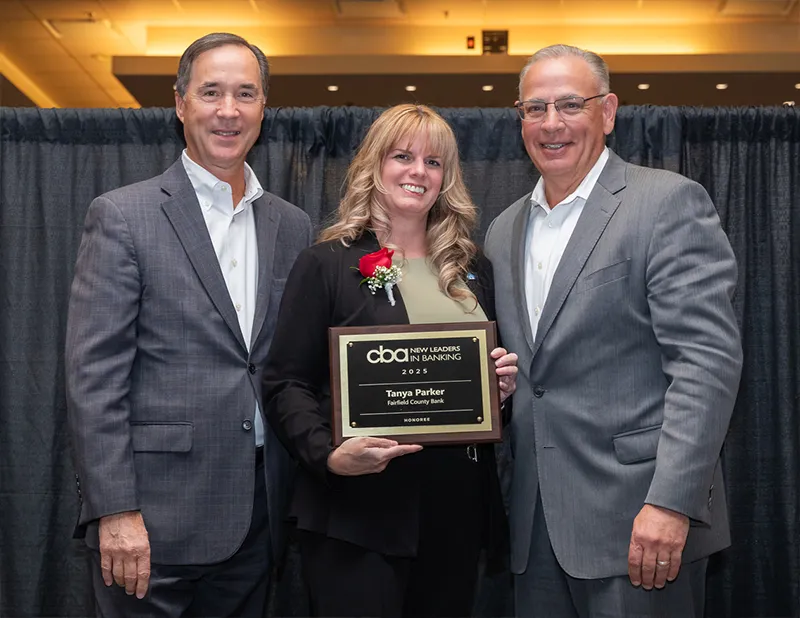 Photographed, from left to right: Tom Mongellow, President and CEO, Connecticut Bankers Association. Tanya Parker, VP, Compliance Officer, Fairfield County Bank. David Schneider, CEO, Fairfield County Bank.
