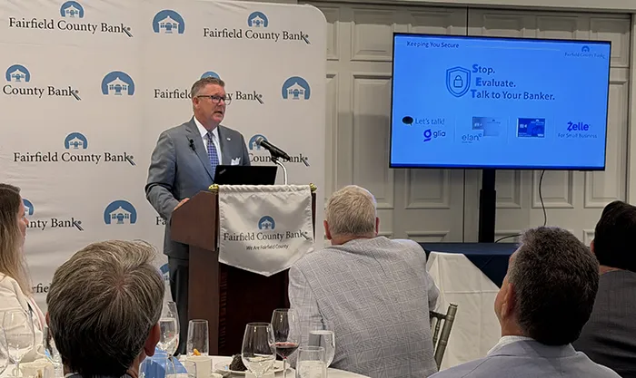 Photographed: Fairfield County Bank President Daniel L. Berta speaking during the Annual Meeting