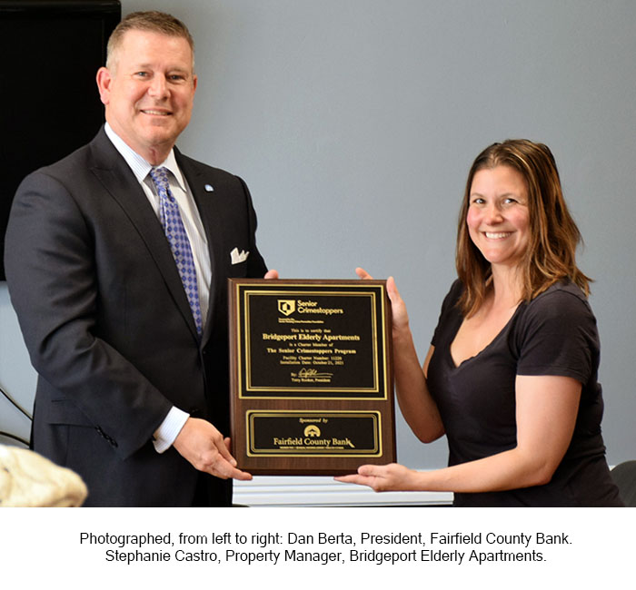 Photographed, from left to right: Dan Berta, President, Fairfield County Bank. Stephanie Castro, Property Manager, Bridgeport Elderly Apartments.